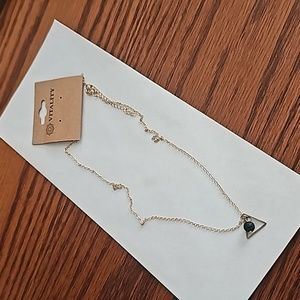 NWT Vitality brand necklace With triangle and charcoal bead for scenting